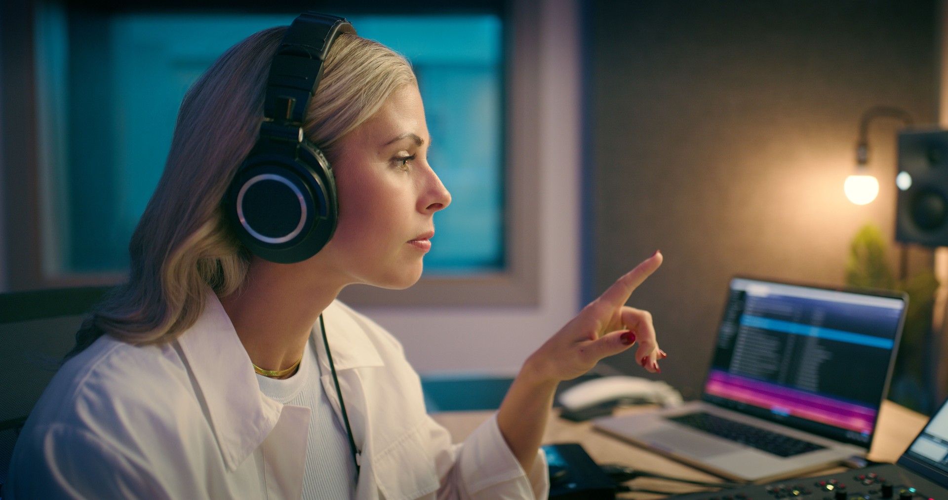Headphones, song and producer with woman in recording studio for audio engineer, sound editor and project. Music production and media label with dj or person in control room for composer artist